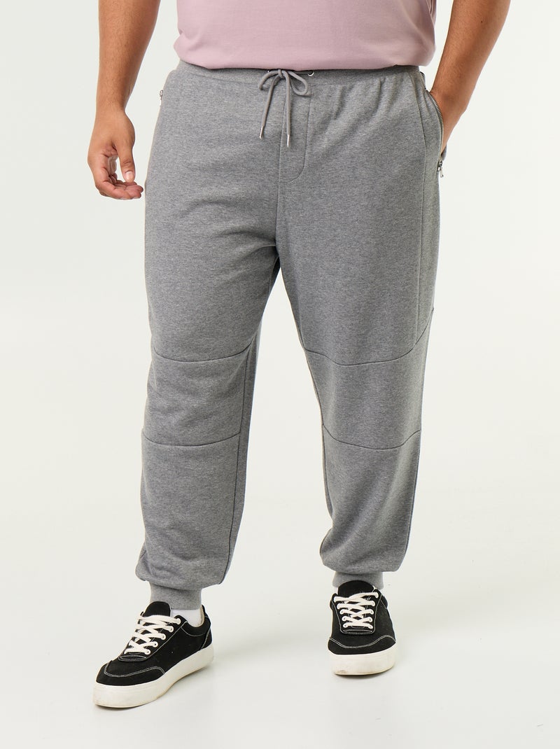 Pantalon de jogging avec bas resserré et poches zippées Gris - Kiabi