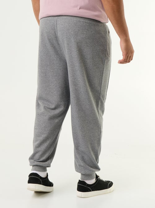 Pantalon de jogging avec bas resserré et poches zippées - Kiabi