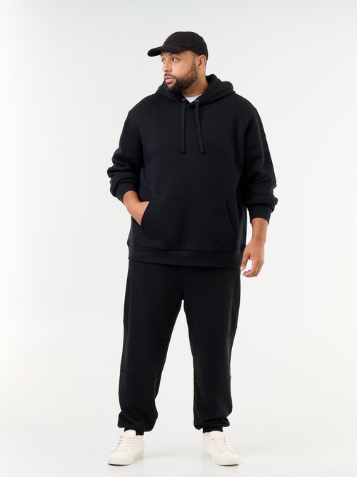 Pantalon de jogging avec bas resserré et poches zippées - Kiabi Pantalon de jogging avec bas resserré et poches zippées - Kiabi