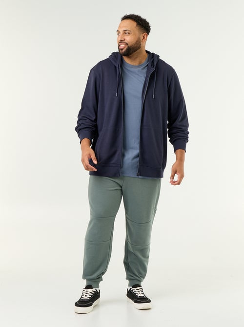 Pantalon de jogging avec bas resserré et poches zippées - Kiabi