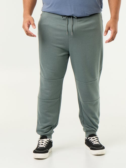 Pantalon de jogging avec bas resserré et poches zippées - Kiabi