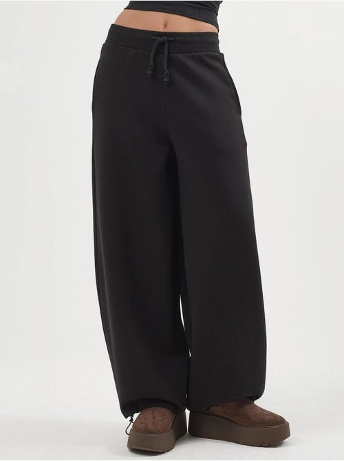 Pantalon de jogging en maille mélangée coton femme busem - Kiabi Pantalon de jogging en maille mélangée coton femme busem - Kiabi