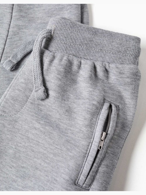 Pantalon de jogging en molleton avec cordon de serrage et poches - Kiabi Pantalon de jogging en molleton avec cordon de serrage et poches - Kiabi
