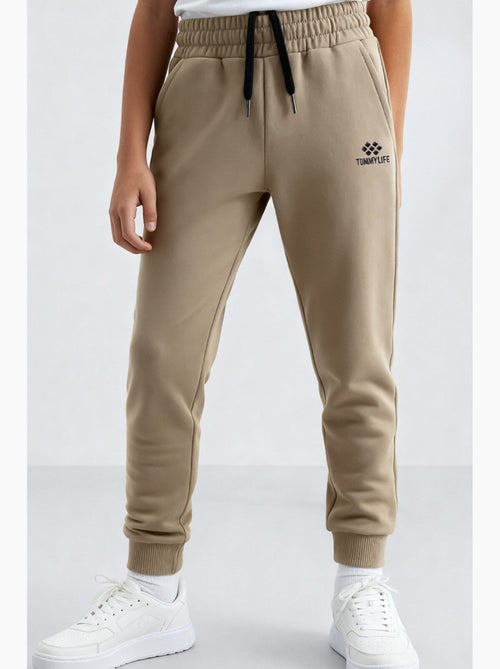 Pantalon de jogging enfant tommy - Kiabi Pantalon de jogging enfant tommy - Kiabi