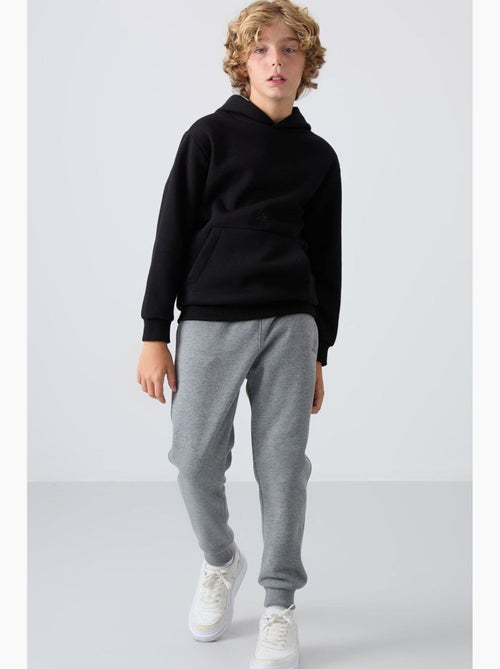 Pantalon de jogging enfant tommy - Kiabi Pantalon de jogging enfant tommy - Kiabi
