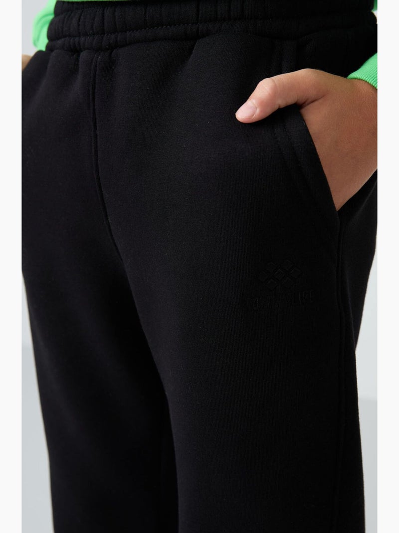 Pantalon de jogging enfant tommy Noir - Kiabi