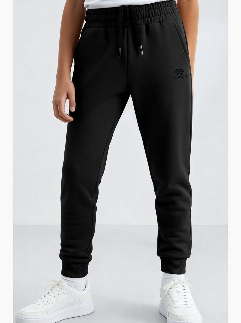 Pantalon de jogging enfant tommy Noir - Kiabi