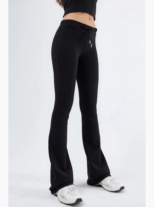 Pantalon de jogging évasé taille mi-haute avec cordon busem - Kiabi Pantalon de jogging évasé taille mi-haute avec cordon busem - Kiabi