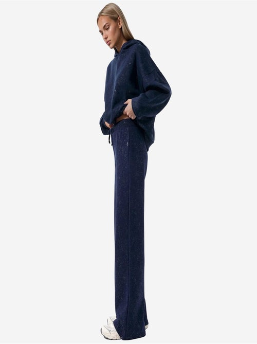 Pantalon de jogging femme en coton et élasthanne busem - Kiabi Pantalon de jogging femme en coton et élasthanne busem - Kiabi