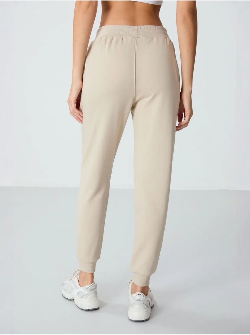 Pantalon de jogging femme en mélange de coton tommy Sable - Kiabi