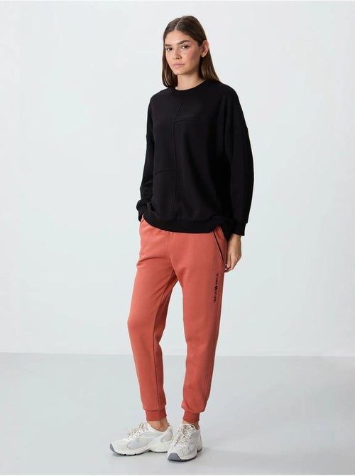 Pantalon de jogging femme en mélange de coton tommy - Kiabi Pantalon de jogging femme en mélange de coton tommy - Kiabi