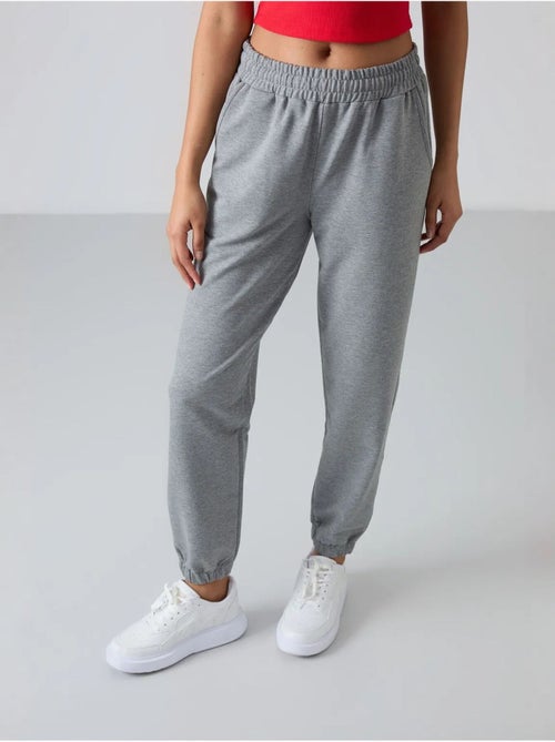 Pantalon de jogging femme taille haute coupe décontractée tommy - Kiabi Pantalon de jogging femme taille haute coupe décontractée tommy - Kiabi