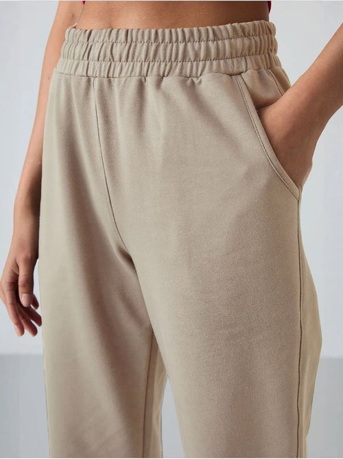 Pantalon de jogging femme taille haute coupe décontractée tommy - Kiabi Pantalon de jogging femme taille haute coupe décontractée tommy - Kiabi