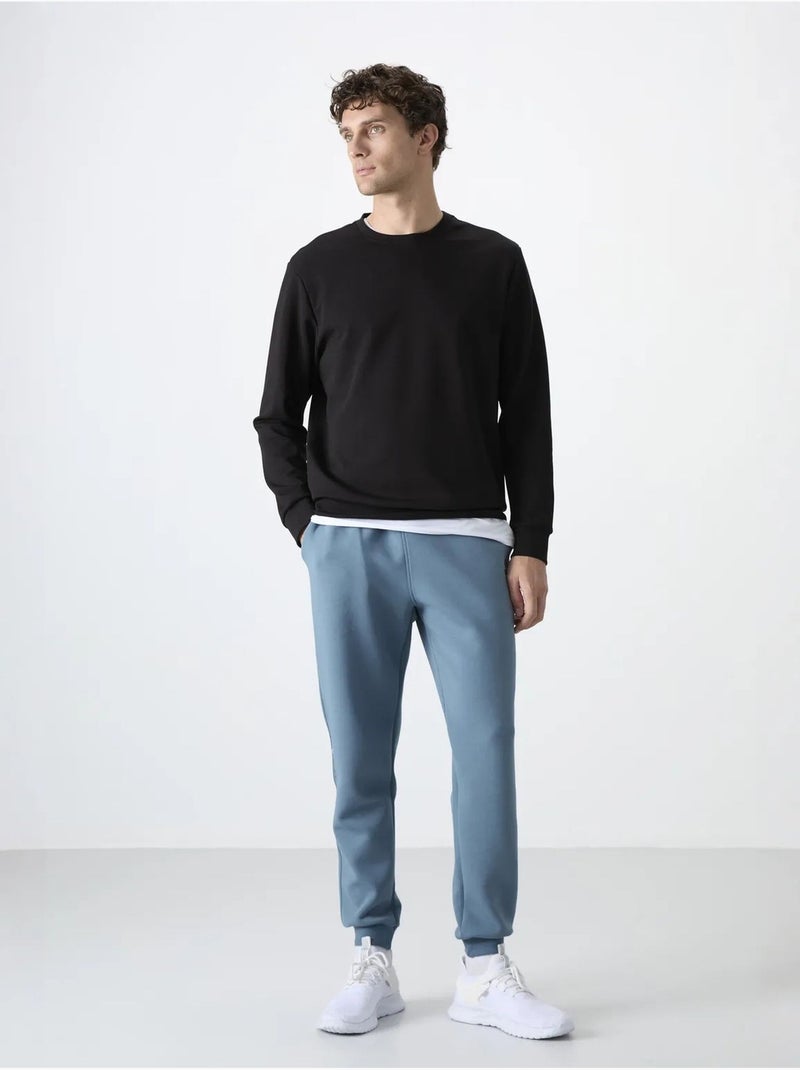 Pantalon de jogging homme à jambe fuselée tommy Bleu saphir - Kiabi