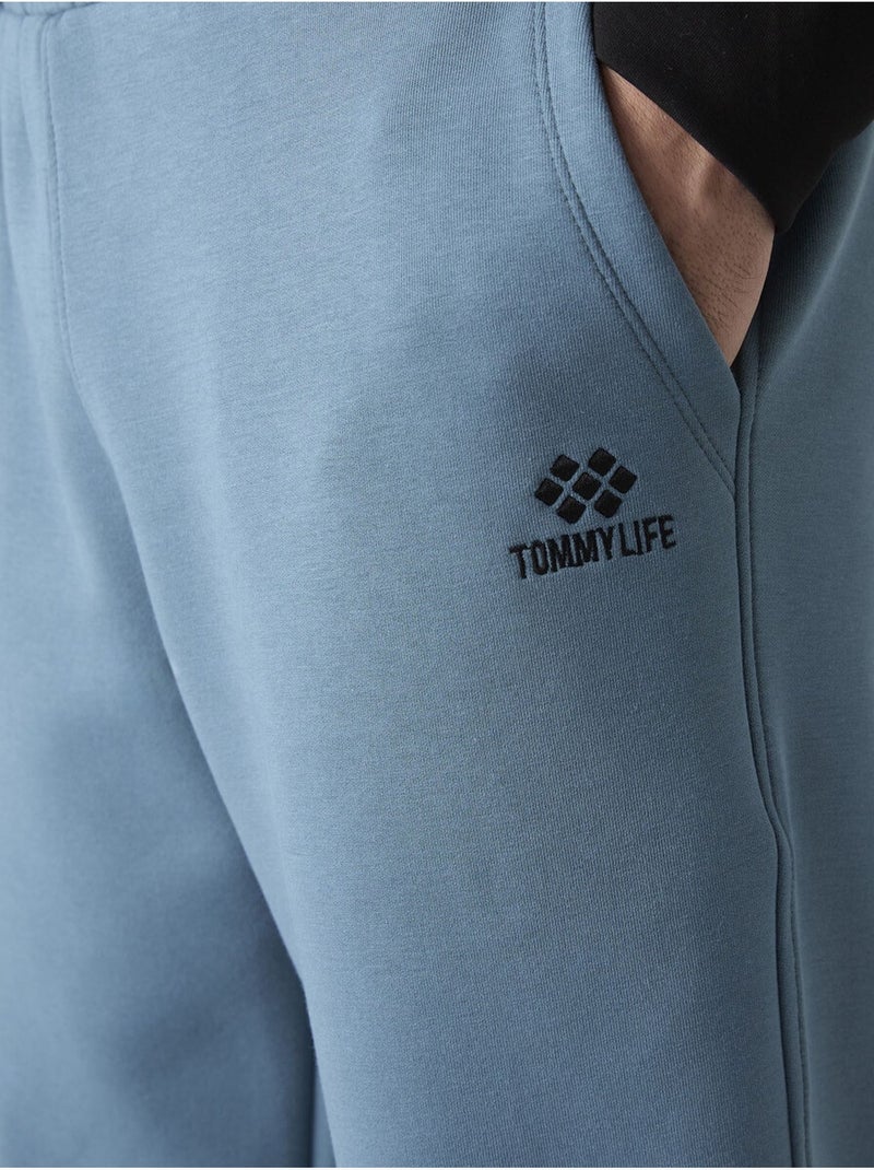 Pantalon de jogging homme à jambe fuselée tommy Bleu saphir - Kiabi