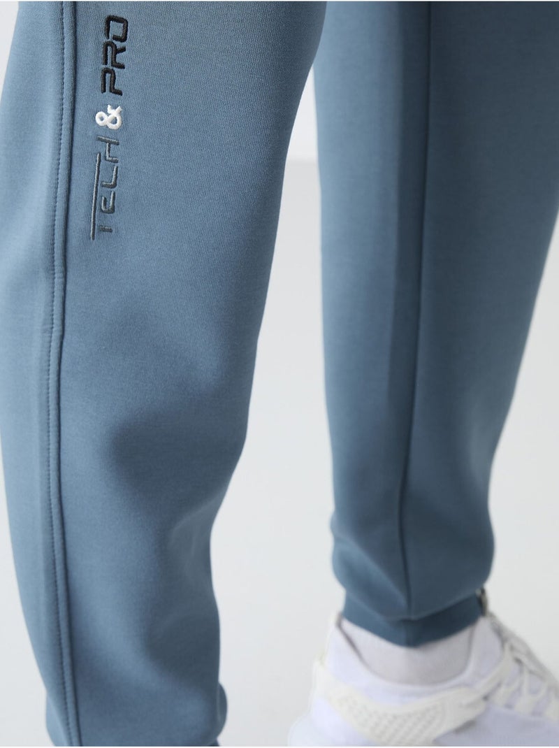 Pantalon de jogging homme à jambe fuselée tommy Bleu saphir - Kiabi