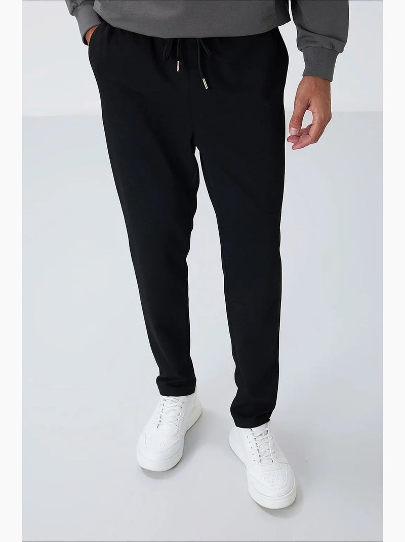 Pantalon de jogging homme à taille élastique tommy Noir - Kiabi