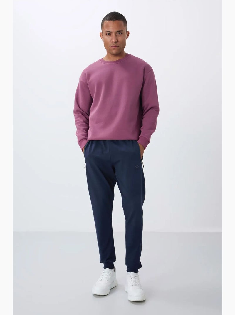 Pantalon de jogging homme avec poche zippée tommy Bleu marine - Kiabi
