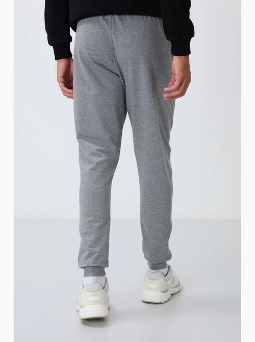 Pantalon de jogging homme avec poche zippée tommy - Kiabi Pantalon de jogging homme avec poche zippée tommy - Kiabi
