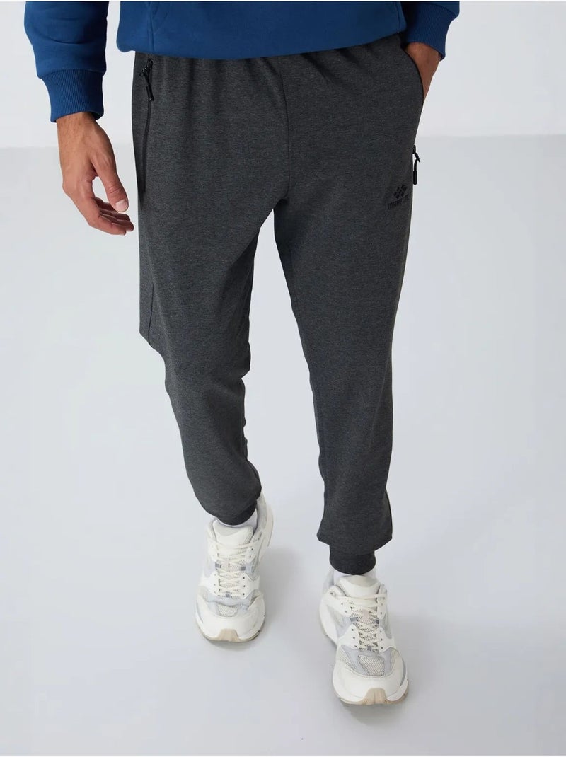 Pantalon de jogging homme avec poche zippée tommy Gris Noir - Kiabi
