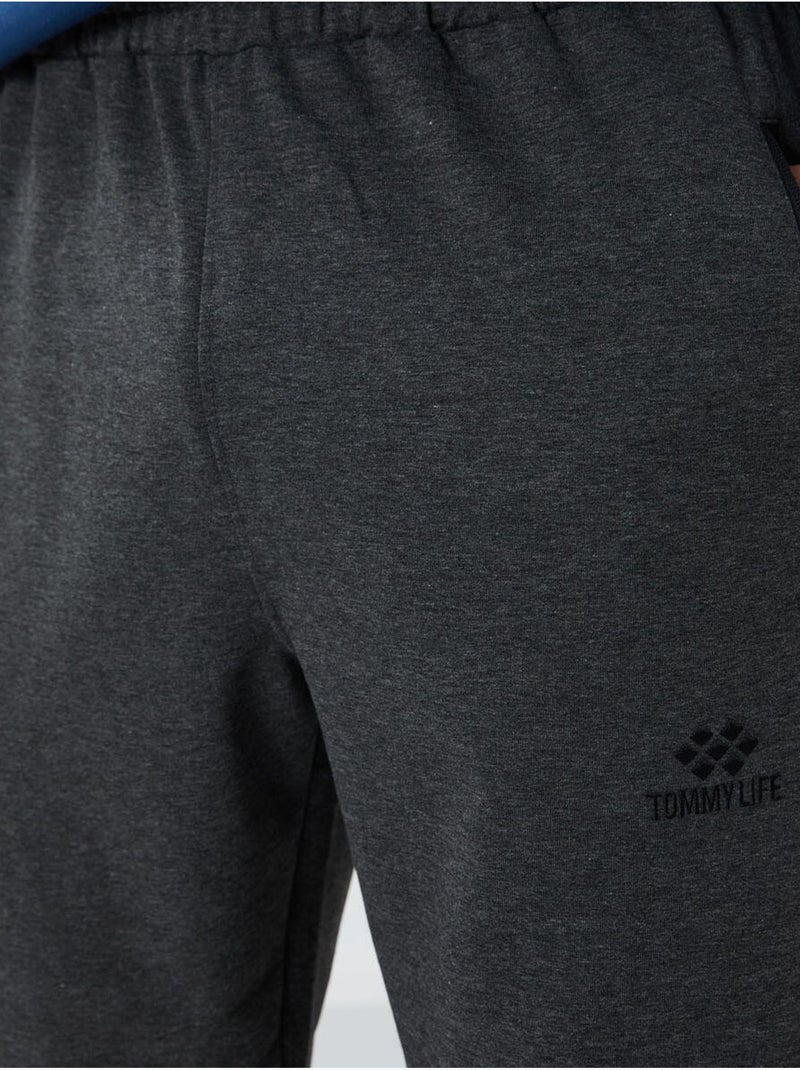 Pantalon de jogging homme avec poche zippée tommy Gris Noir - Kiabi