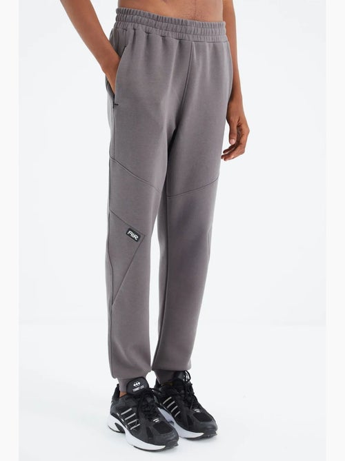 Pantalon de jogging homme coupe décontractée en molleton tommy - Kiabi Pantalon de jogging homme coupe décontractée en molleton tommy - Kiabi