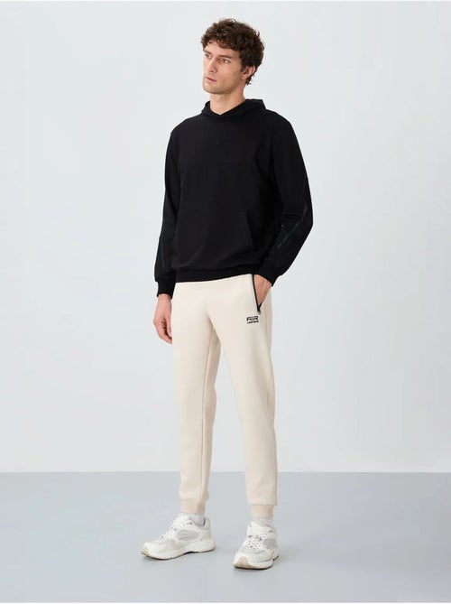 Pantalon de jogging homme coupe jogger tommy - Kiabi Pantalon de jogging homme coupe jogger tommy - Kiabi
