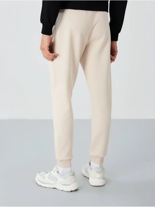 Pantalon de jogging homme coupe jogger tommy - Kiabi Pantalon de jogging homme coupe jogger tommy - Kiabi