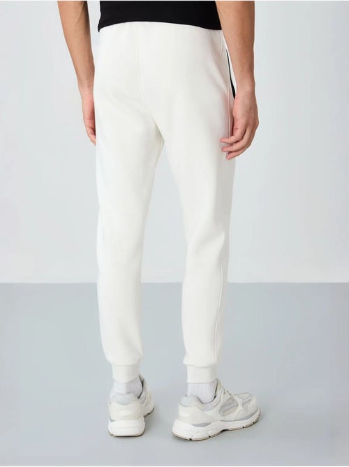 Pantalon de jogging homme coupe jogger tommy - Kiabi Pantalon de jogging homme coupe jogger tommy - Kiabi