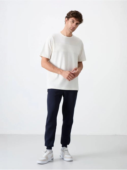 Pantalon de jogging homme coupe jogger tommy - Kiabi Pantalon de jogging homme coupe jogger tommy - Kiabi