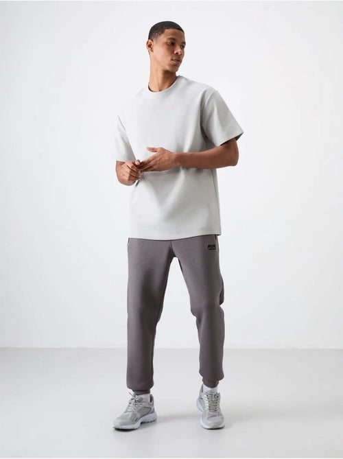 Pantalon de jogging homme coupe jogger tommy - Kiabi Pantalon de jogging homme coupe jogger tommy - Kiabi