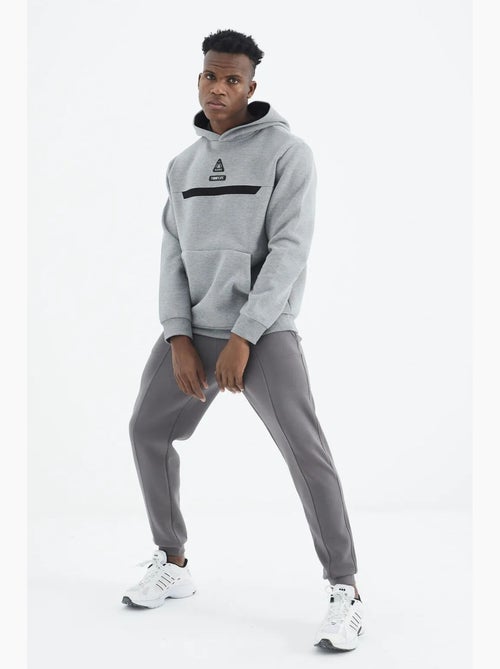 Pantalon de jogging homme coupe regular en molleton 3 fils tommy - Kiabi Pantalon de jogging homme coupe regular en molleton 3 fils tommy - Kiabi