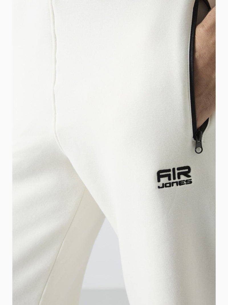Pantalon de jogging homme coupe regular en molleton tommy Blanc cassé - Kiabi