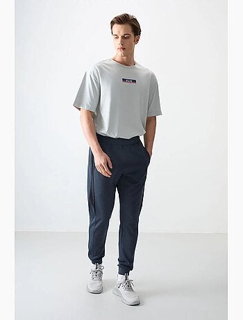 Pantalon de jogging homme coupe regular en molleton tommy