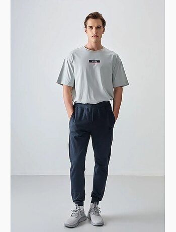 Pantalon de jogging homme coupe regular en molleton tommy