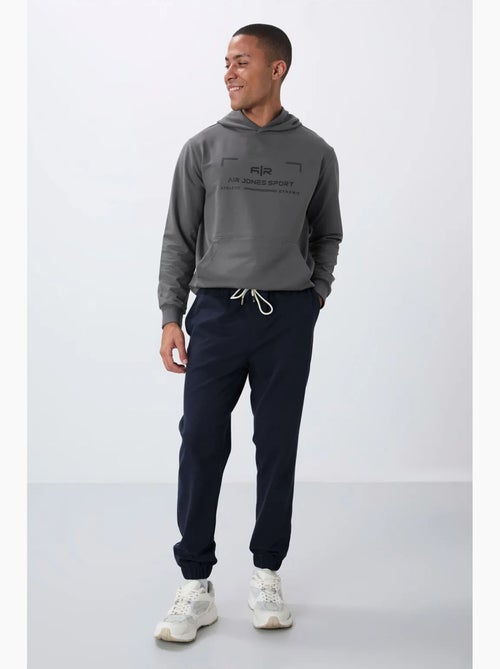 Pantalon de jogging homme coupe regular en molleton tommy - Kiabi Pantalon de jogging homme coupe regular en molleton tommy - Kiabi