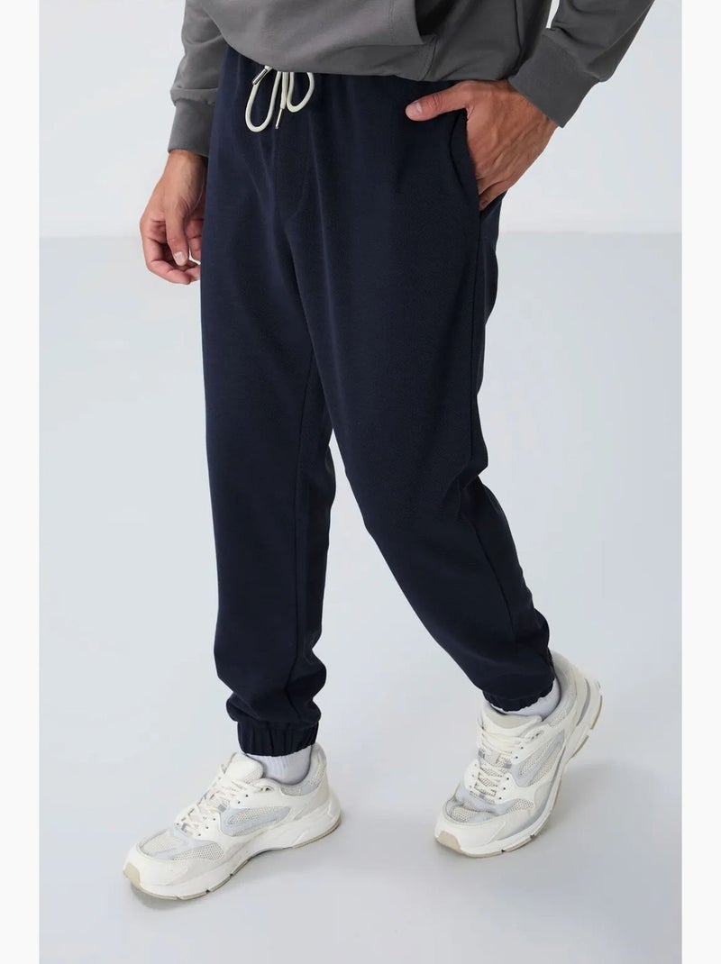 Pantalon de jogging homme coupe regular en molleton tommy Bleu marine - Kiabi