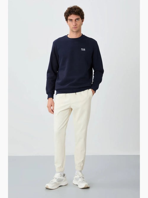 Pantalon de jogging homme coupe regular en molleton tommy - Kiabi Pantalon de jogging homme coupe regular en molleton tommy - Kiabi