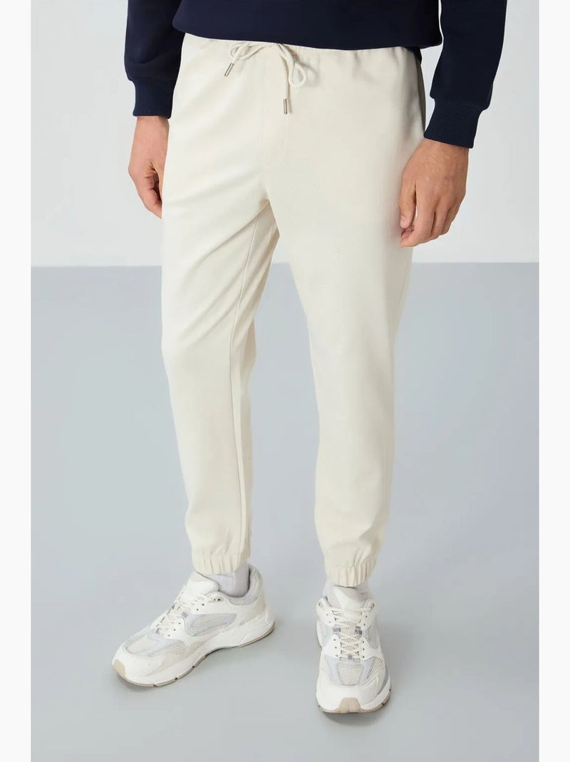 Pantalon de jogging homme coupe regular en molleton tommy Crème - Kiabi