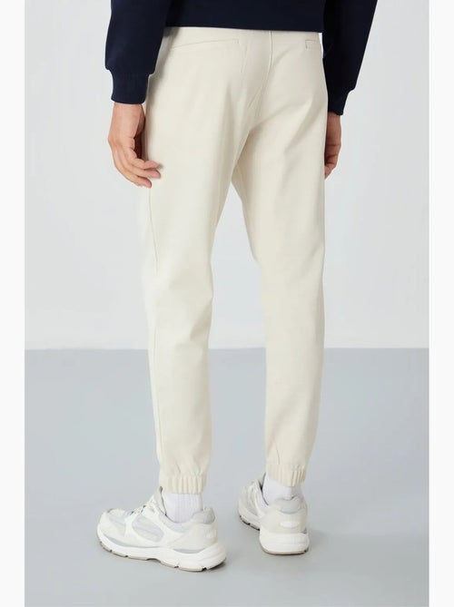 Pantalon de jogging homme coupe regular en molleton tommy - Kiabi Pantalon de jogging homme coupe regular en molleton tommy - Kiabi