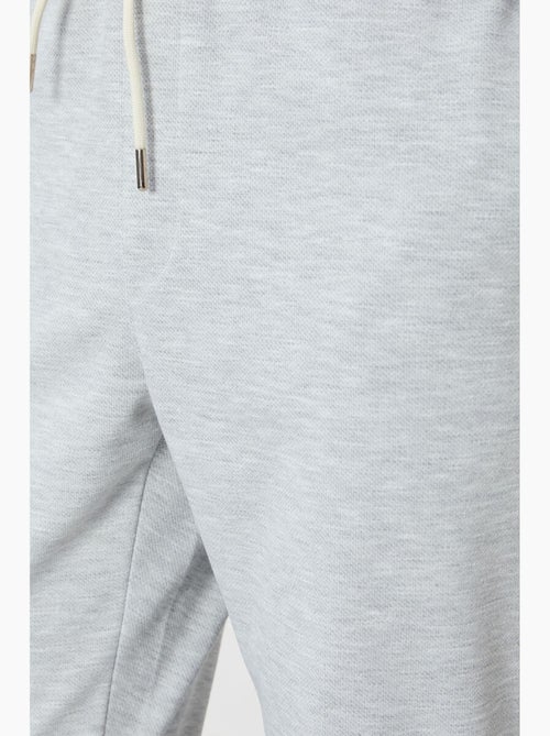 Pantalon de jogging homme coupe regular en molleton tommy - Kiabi Pantalon de jogging homme coupe regular en molleton tommy - Kiabi