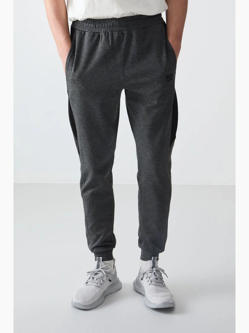 Pantalon de jogging homme coupe regular en molleton tommy Gris Noir - Kiabi