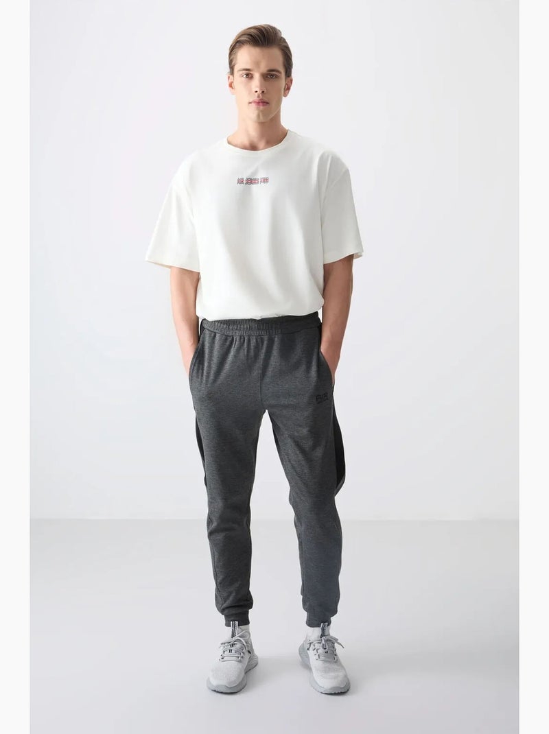 Pantalon de jogging homme coupe regular en molleton tommy Gris Noir - Kiabi