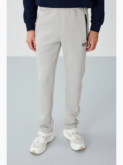 Pantalon de jogging homme coupe regular en molleton tommy - Kiabi Pantalon de jogging homme coupe regular en molleton tommy - Kiabi