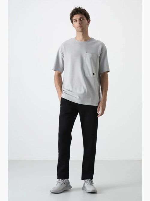 Pantalon de jogging homme coupe regular en molleton tommy - Kiabi Pantalon de jogging homme coupe regular en molleton tommy - Kiabi