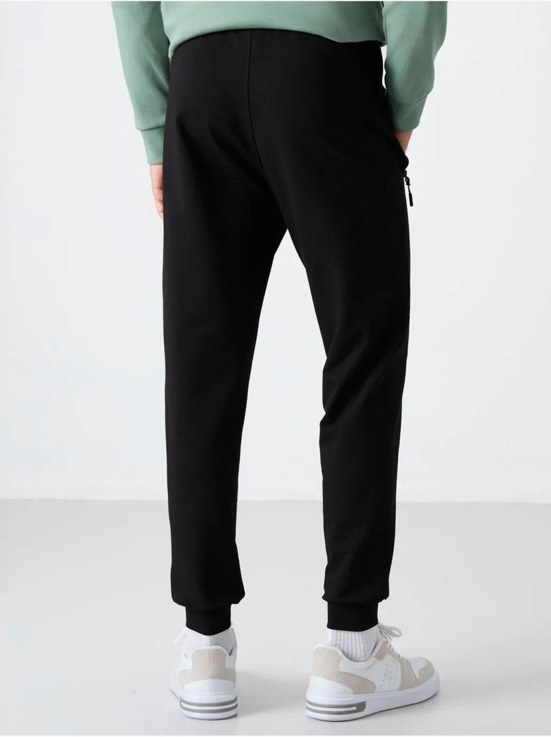Pantalon de jogging homme en mélange coton tommy Gris Noir - Kiabi