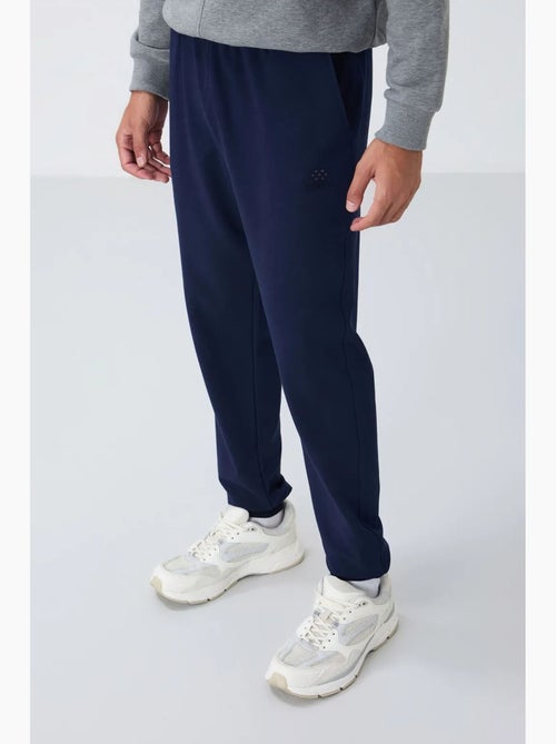 Pantalon de jogging homme en molton uni tommy - Kiabi Pantalon de jogging homme en molton uni tommy - Kiabi
