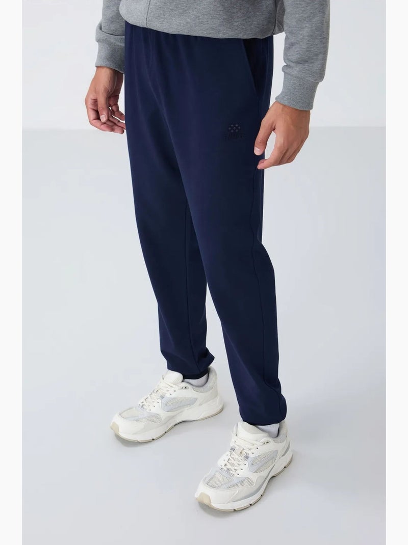 Pantalon de jogging homme en molton uni tommy Bleu marine - Kiabi