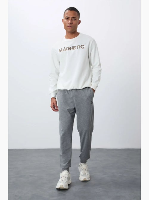 Pantalon de jogging homme en molton uni tommy - Kiabi Pantalon de jogging homme en molton uni tommy - Kiabi