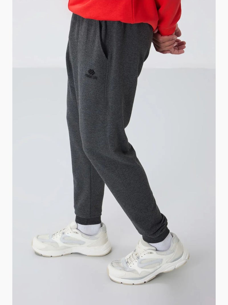 Pantalon de jogging homme en molton uni tommy Gris Noir - Kiabi